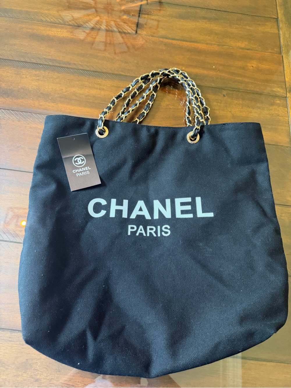 Authentic CHANEL Black Canvas Tote with Gold Chain Handles